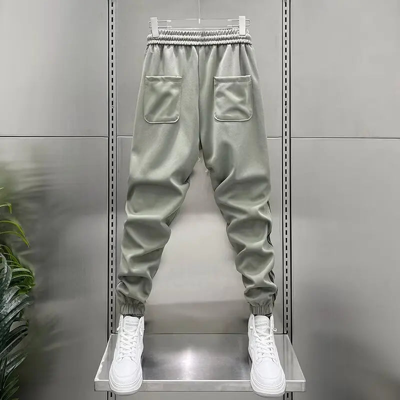 ELASTIC STRIPED JOGGERS